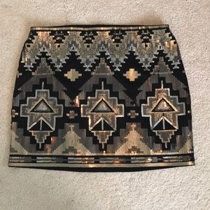 Black sequined mini skirt